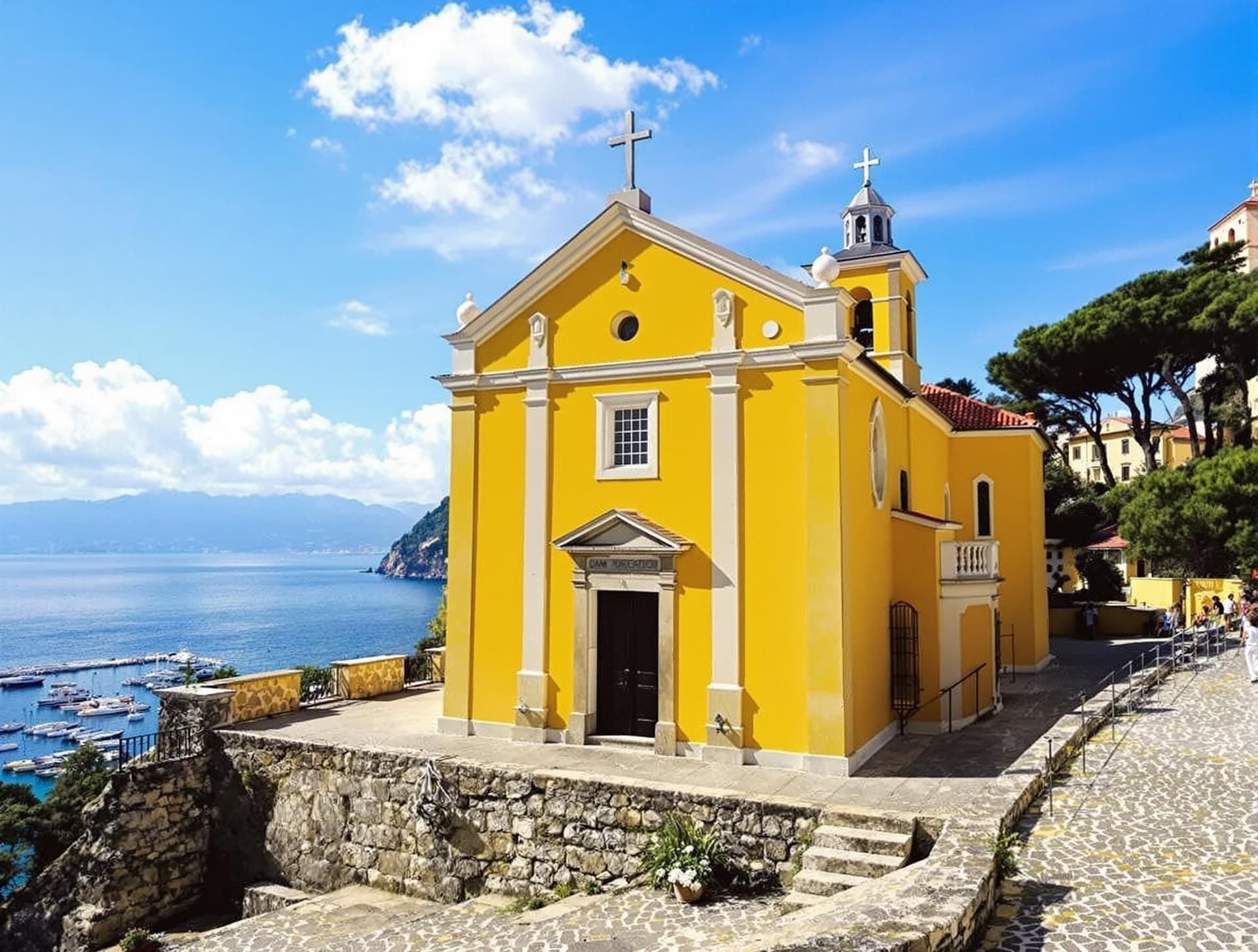 San Giorgio-kyrkan i Portofino, Italien, en gul kyrka från 1100-talet på en udde med vacker utsikt över hamnen